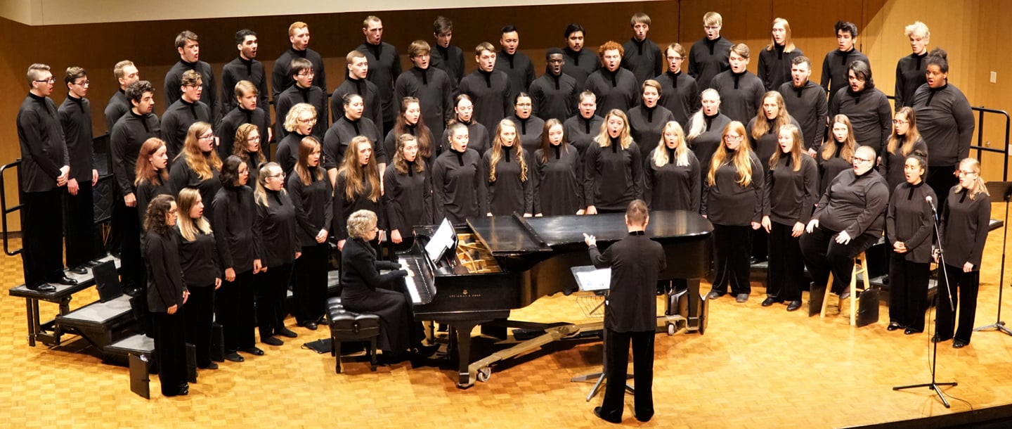 Students in Minnesota State University Choral Ensemble practicing music