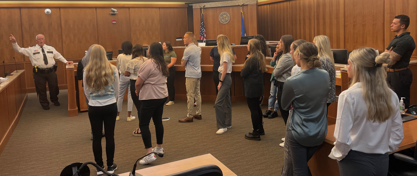 Students taking a tour of a courthouse