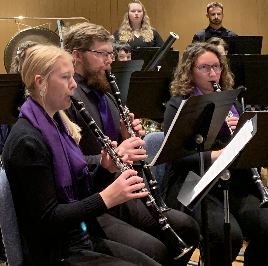 a group of people playing instruments