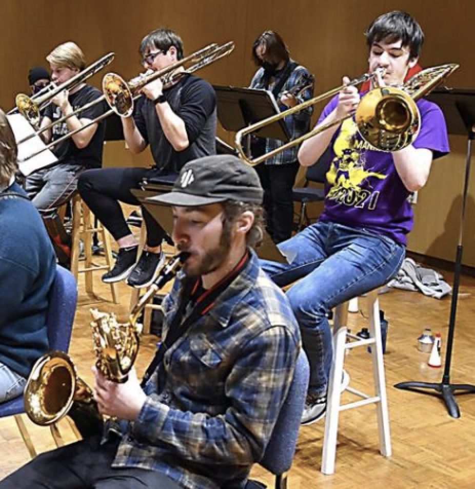 a group of people playing instruments