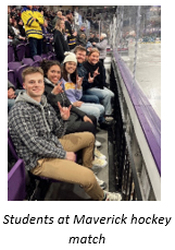 Students at Maverick Hockey game