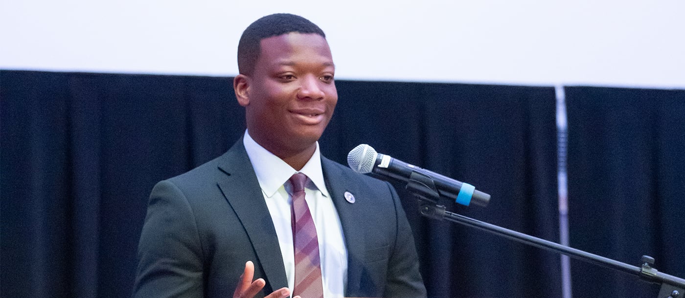 Graduate student giving a speech