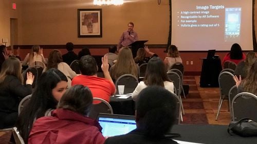 I-O psych students listening to a speaker while attending the MPPAW conference in Minneapolis