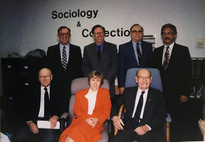 a group of people posing for a photo