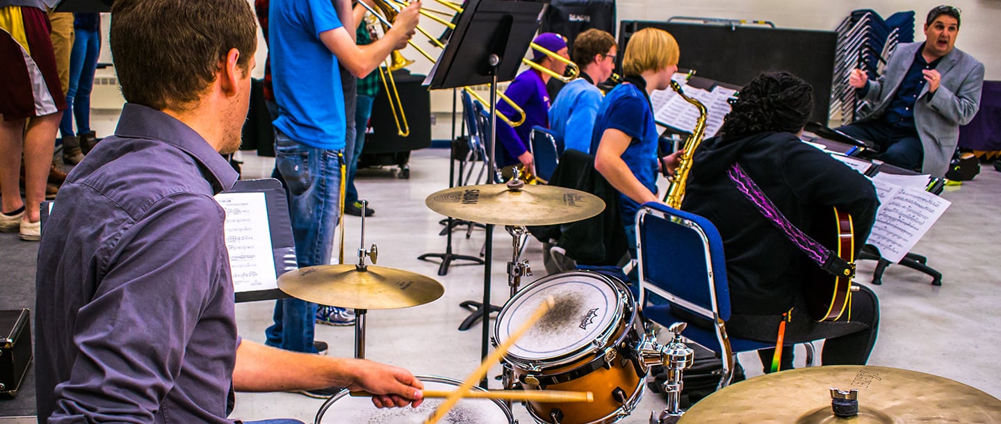 Students in Jazz Mavericks practicing with their instructor