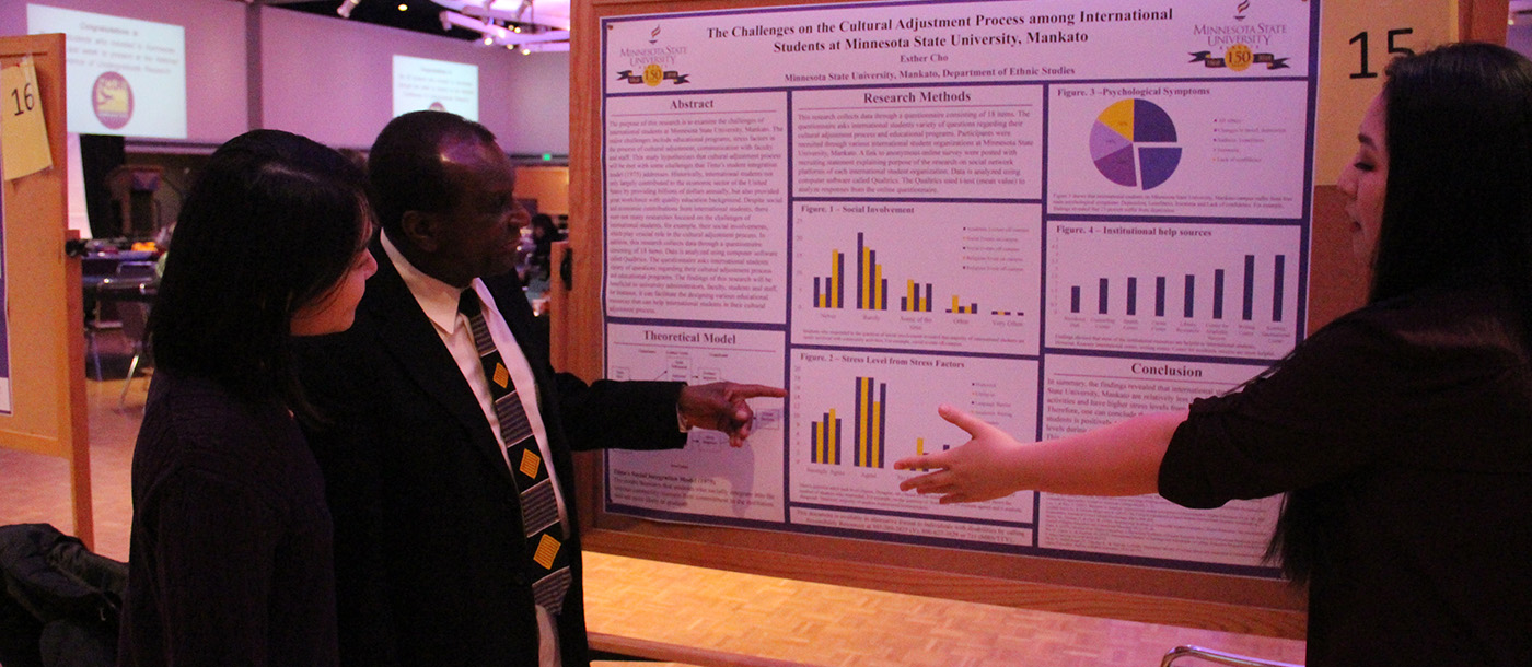 Student presenting to the faculty
